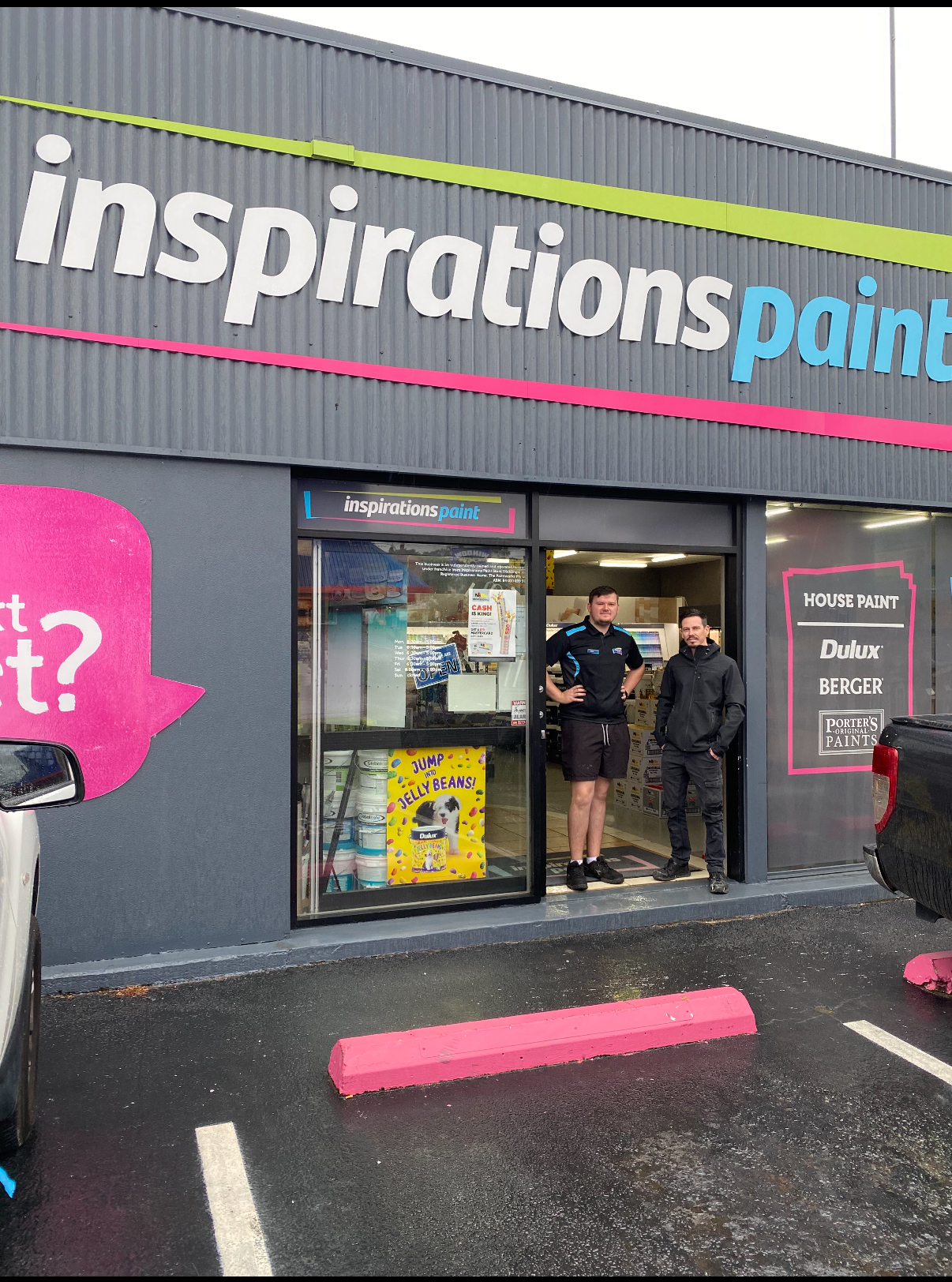 Brad and Nick, the owners of Inspirations Paint West Ipswich, standing a the front door of thier shop.
